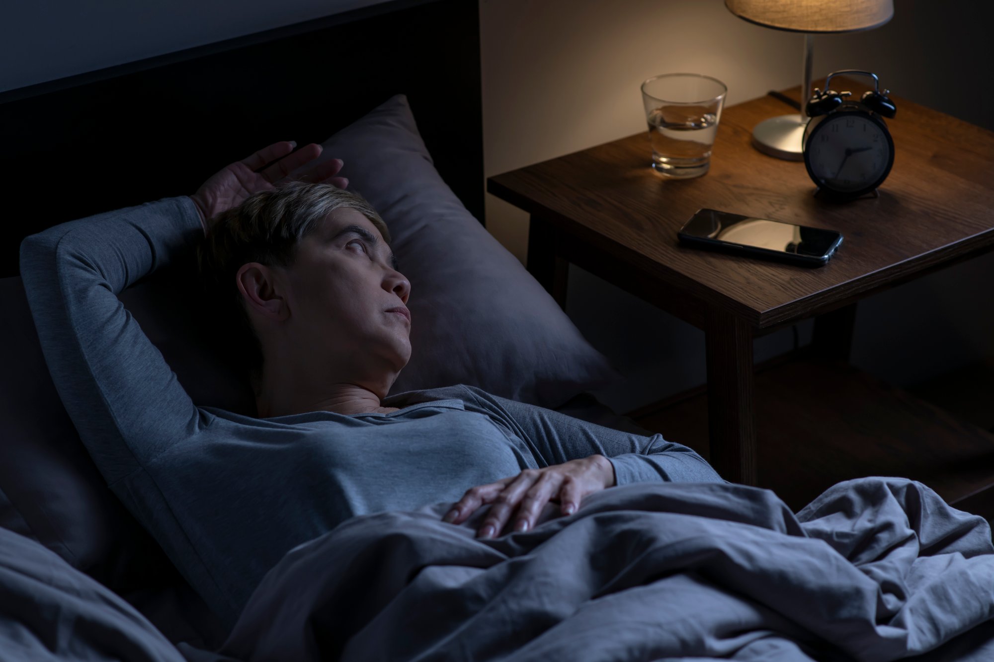 worried-woman-layingdown